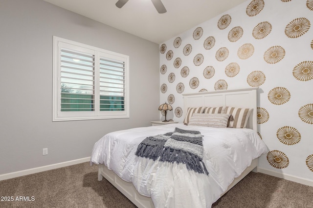 bedroom featuring ceiling fan and carpet