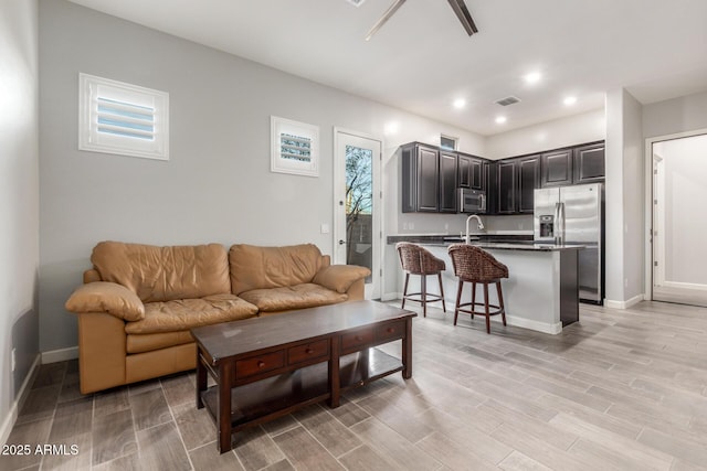 living room with sink