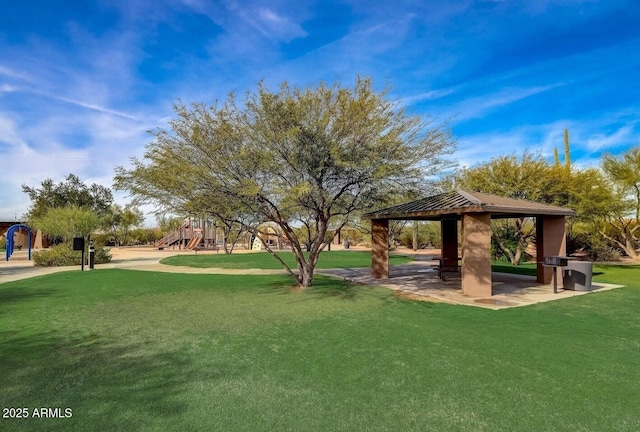 view of home's community featuring a gazebo, a yard, and a playground