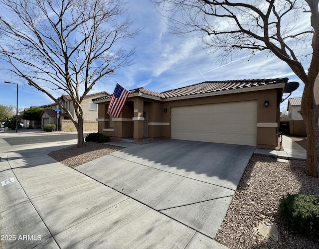 view of front of home with a garage