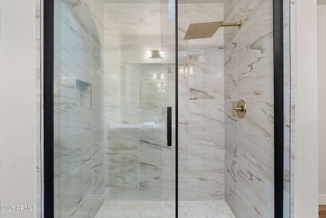 bathroom with a shower stall