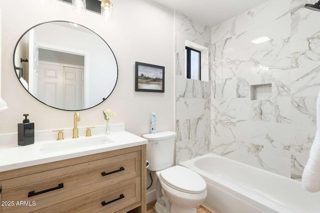 bathroom with toilet, shower / washtub combination, and vanity