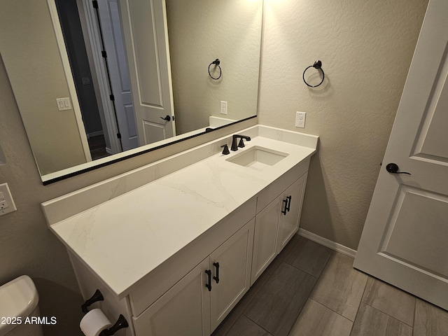 18871 S 209th Way, Queen Creek, AZ 85142 - bathroom featuring vanity and a textured wall
