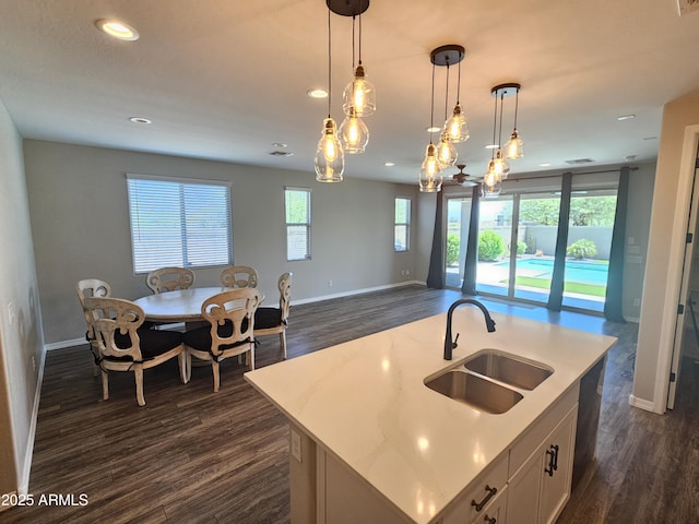 18871 S 209th Way, Queen Creek, AZ 85142 - kitchen with dark wood-style flooring, open floor plan, an island with sink, pendant lighting, and recessed lighting