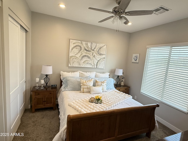 bedroom featuring recessed lighting, a closet, visible vents, and carpet floors