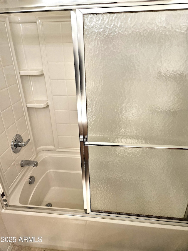 1265 S Aaron Unit 299, Mesa, AZ 85209 - bathroom with bath / shower combo with glass door