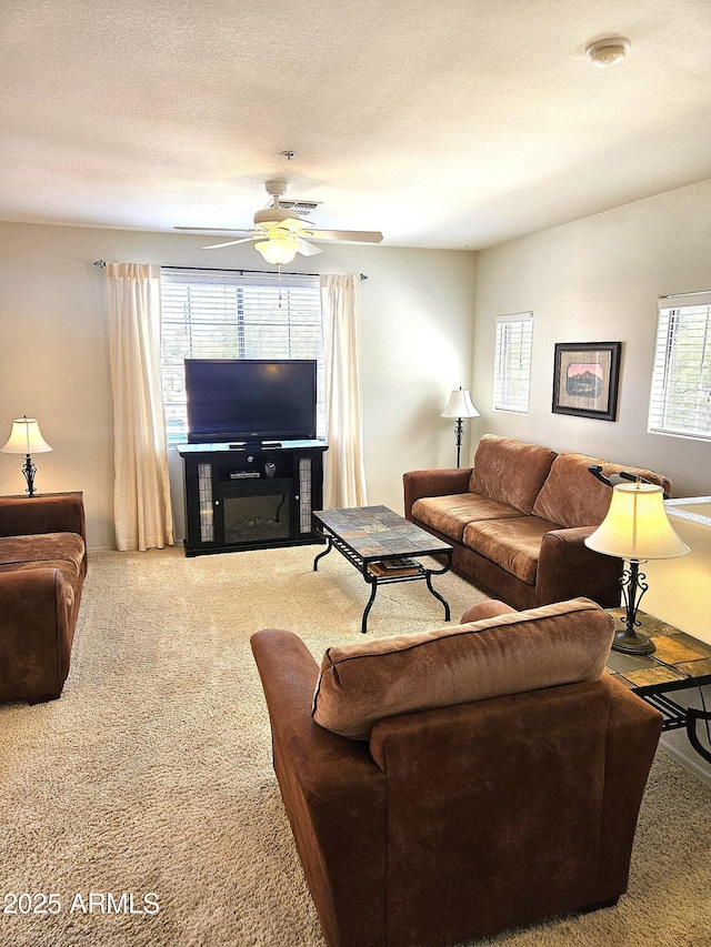 1265 S Aaron Unit 299, Mesa, AZ 85209 - living room featuring carpet floors and a ceiling fan