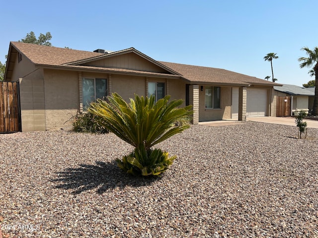 ranch-style home with a garage