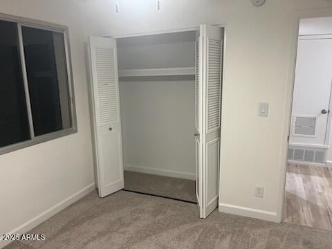 18045 N 20th Ln N, Phoenix, AZ 85023 - unfurnished bedroom with baseboards and carpet floors