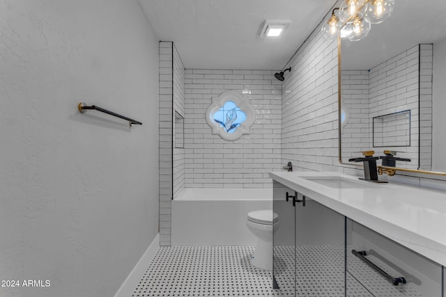 full bathroom featuring vanity, toilet, and tiled shower / bath combo