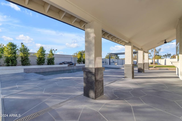 view of patio / terrace featuring ceiling fan