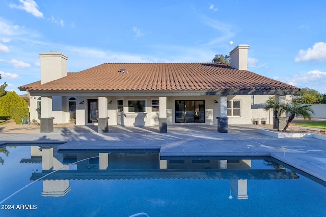 rear view of house with a patio