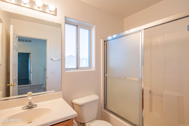 3365 N Sunaire, Mesa, AZ 85215 - bathroom with vanity, combined bath / shower with glass door, and toilet