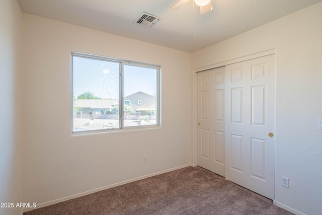 3365 N Sunaire, Mesa, AZ 85215 - unfurnished bedroom with carpet floors, a closet, baseboards, and a ceiling fan