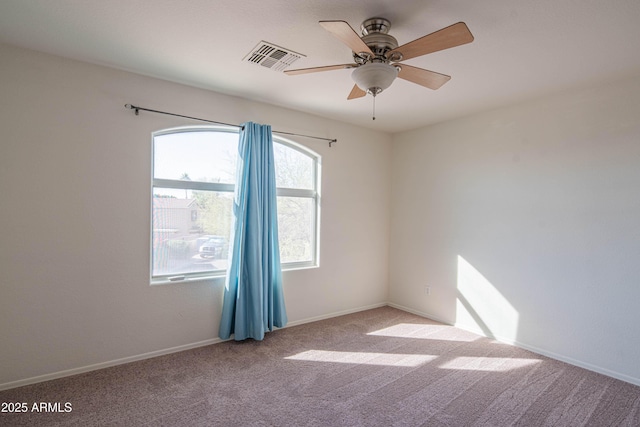 3365 N Sunaire, Mesa, AZ 85215 - unfurnished room with a ceiling fan, carpet floors, and baseboards