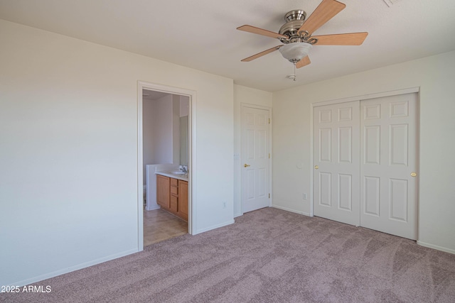 3365 N Sunaire, Mesa, AZ 85215 - unfurnished bedroom featuring light carpet, a closet, baseboards, and ensuite bath