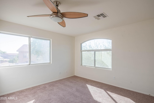 3365 N Sunaire, Mesa, AZ 85215 - carpeted empty room with healthy amount of natural light, ceiling fan, and baseboards