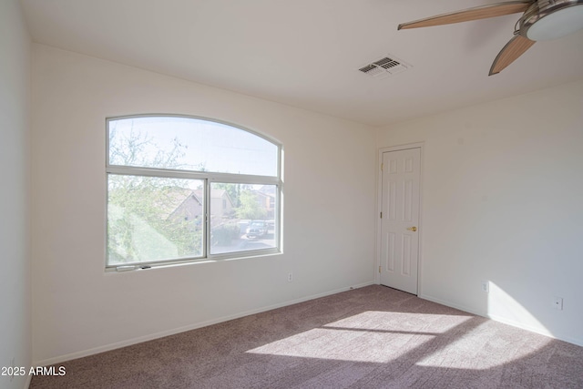 3365 N Sunaire, Mesa, AZ 85215 - spare room featuring carpet floors, ceiling fan, and baseboards