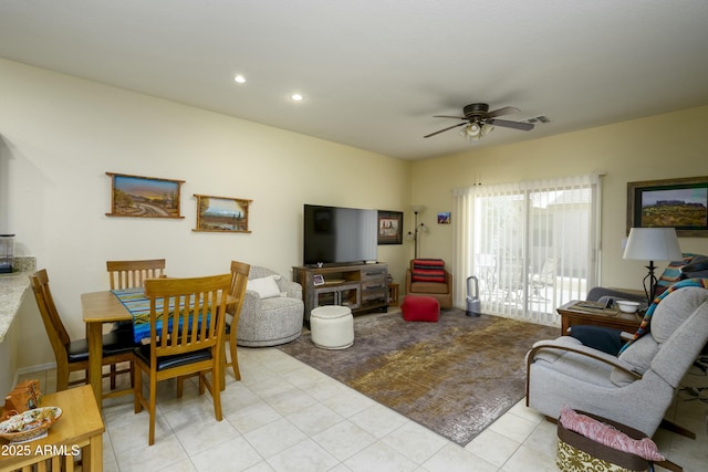 living area with recessed lighting, visible vents, and a ceiling fan