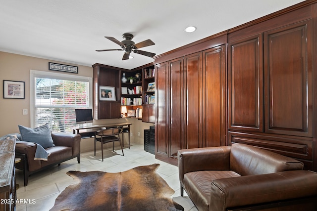 office area with light tile patterned flooring and a ceiling fan