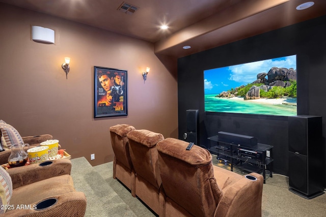 home theater featuring visible vents and carpet flooring