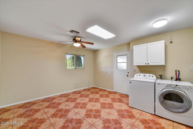 washroom featuring cabinets, ceiling fan, and independent washer and dryer