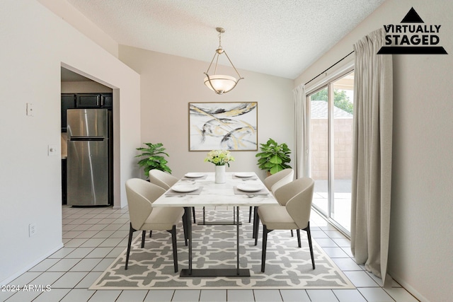 16410 S 46th Pl, Phoenix, AZ 85048 - dining space with baseboards, a textured ceiling, and vaulted ceiling