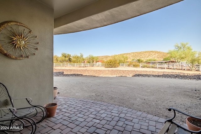 view of patio featuring a mountain view