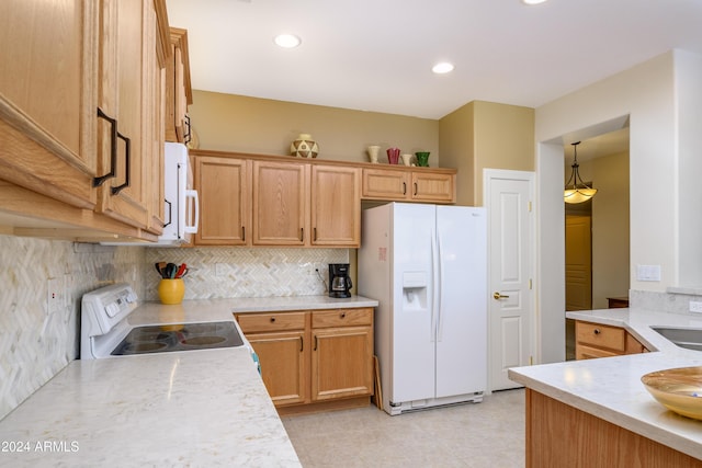 kitchen with sink, pendant lighting, white appliances, decorative backsplash, and light tile patterned floors