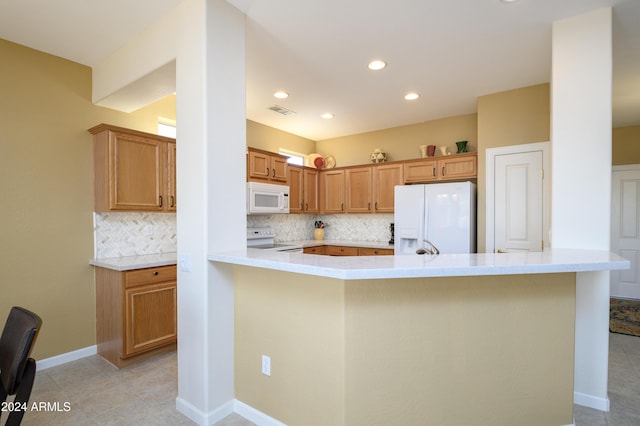 kitchen with kitchen peninsula, white appliances, backsplash, and light tile patterned floors