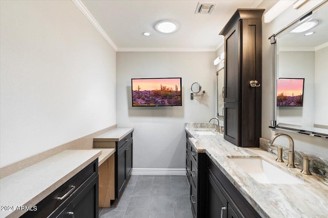 bathroom featuring vanity, tile patterned flooring, and ornamental molding