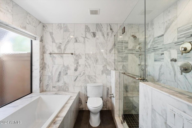 bathroom with plus walk in shower, tile walls, tile patterned floors, and toilet