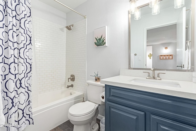 bathroom featuring toilet, shower / bath combo, and vanity