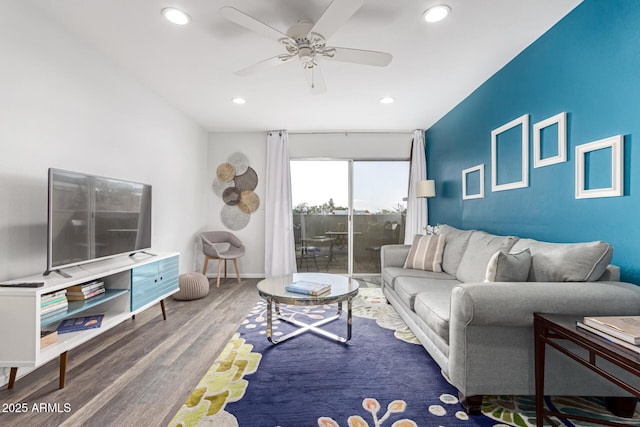 living room with ceiling fan, baseboards, wood finished floors, and recessed lighting