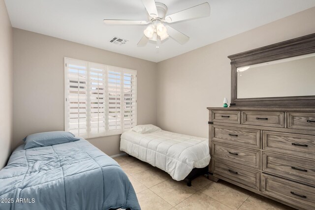 6631 E Rhodes St, Mesa, AZ 85215 - bedroom featuring light tile patterned floors and ceiling fan