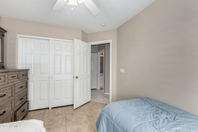 6631 E Rhodes St, Mesa, AZ 85215 - bedroom with light tile patterned flooring, a closet, and ceiling fan