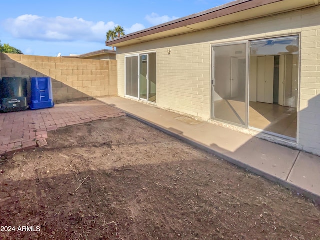 rear view of property featuring a patio