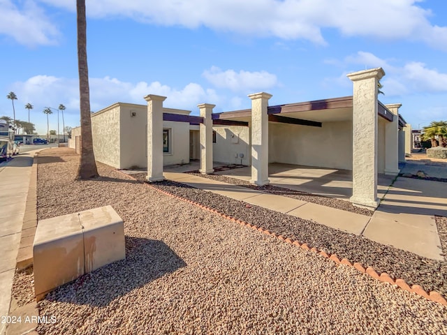 exterior space with a patio