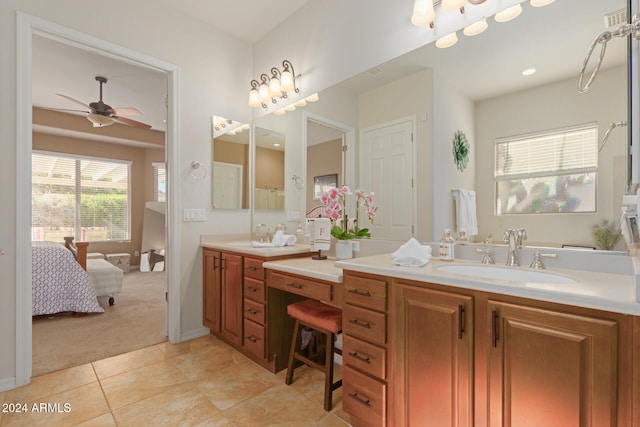 bathroom featuring vanity, ceiling fan, and tile patterned floors