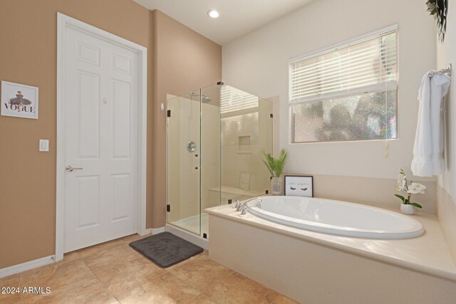 bathroom with independent shower and bath