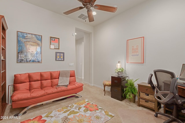 carpeted office with ceiling fan