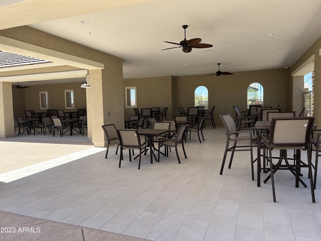 dining space with ceiling fan