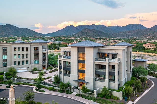 outdoor building at dusk featuring a mountain view