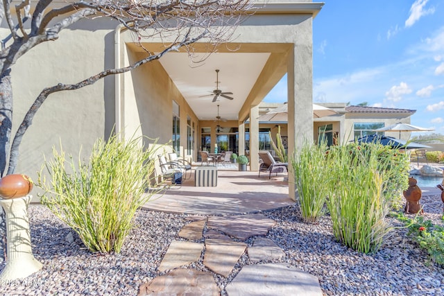 view of patio / terrace with ceiling fan