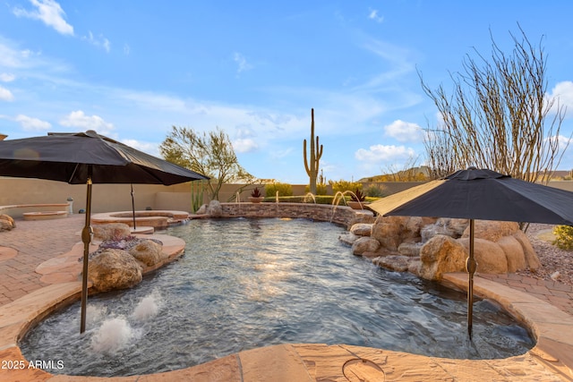 view of pool with a fenced in pool