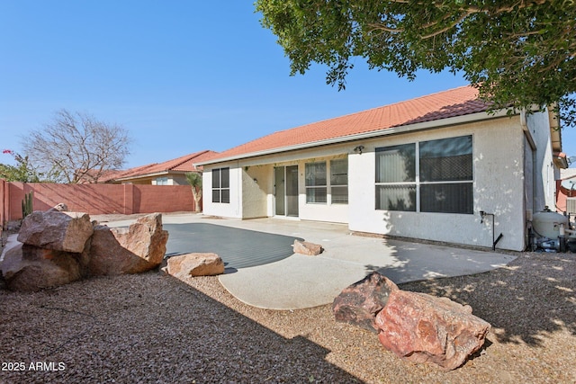 rear view of property with a patio