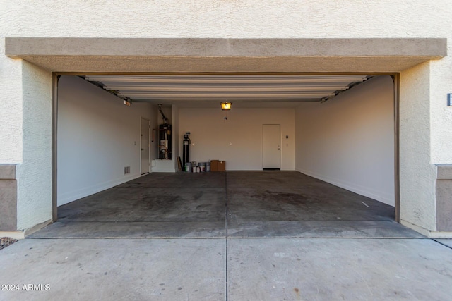 garage featuring water heater