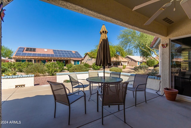 view of patio with ceiling fan