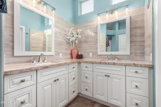 bathroom featuring backsplash and vanity