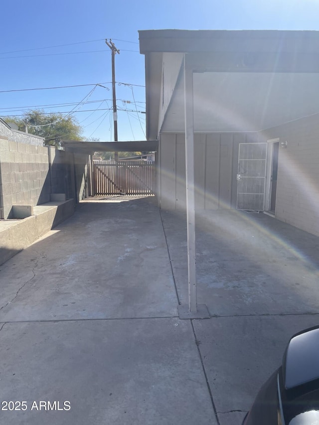 view of patio / terrace featuring fence